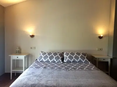 Cama o camas de una habitación en Ca l'Aloy