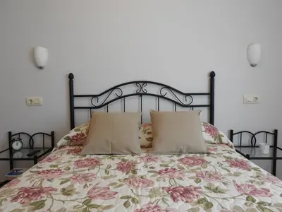 Cama o camas de una habitación en Ca l'Aloy