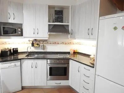 Una cocina o zona de cocina en Ca l'Aloy