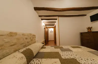 Una televisión o centro de entretenimiento en Casa Rural El Solanar