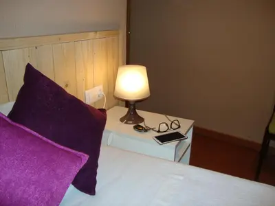 Cama o camas de una habitación en Balcón curva de Estafeta - Centro
