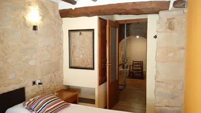 Cama o camas de una habitación en Alojamiento La Fresneda
