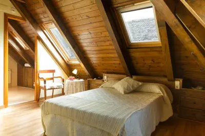 Cama o camas de una habitación en Hostal Aiguamog