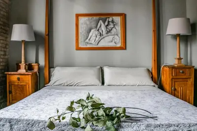 Cama o camas de una habitación en Apartamentos Basilicus