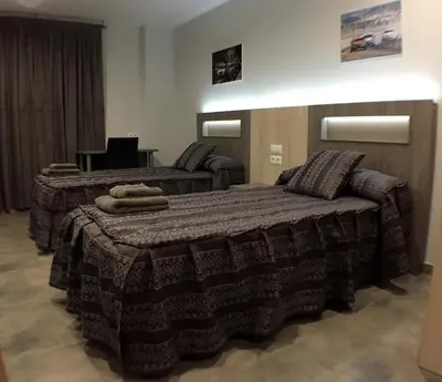 Cama o camas de una habitación en Apartamentos de turismo rural Las Eras