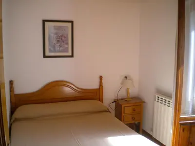 Cama o camas de una habitación en Casa Rural López Ordesa