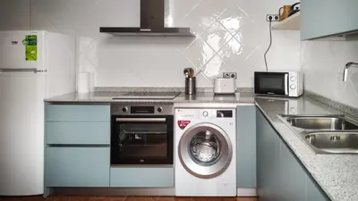 Una cocina o zona de cocina en AT Compañía 100 m2 2 WC