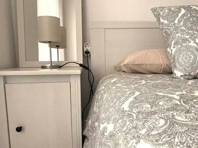 Cama o camas de una habitación en Apartamento Ayla San Fermín