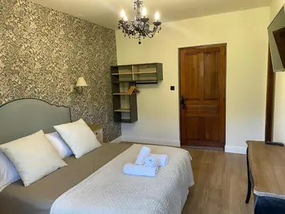 Cama o camas de una habitación en Leyendas Del Pirineo