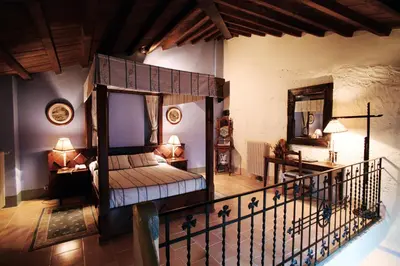 Cama o camas de una habitación en Hospederia Meson de la Dolores
