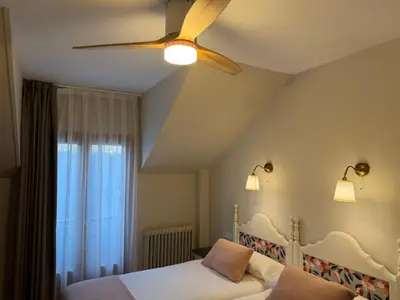 Cama o camas de una habitación en Edelweiss Hotel