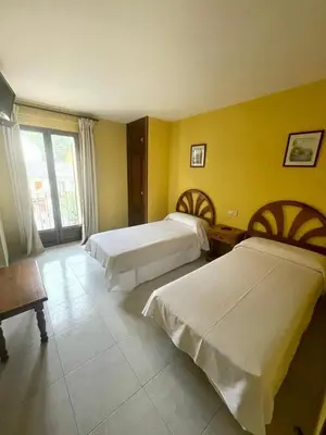 Cama o camas de una habitación en Hostal Rural Sositana