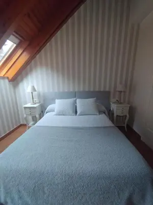 Cama o camas de una habitación en Hotel Ostau d'Òc