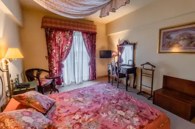 Cama o camas de una habitación en Hotel Alhama