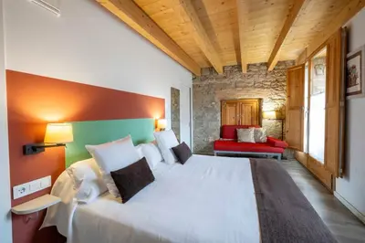 Cama o camas de una habitación en Hotel La Freixera