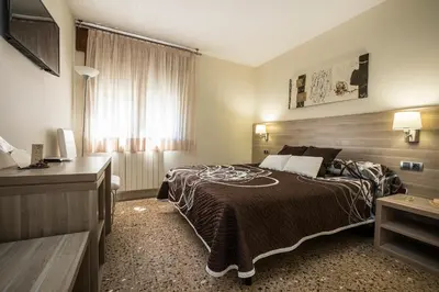 Cama o camas de una habitación en Hotel Victor