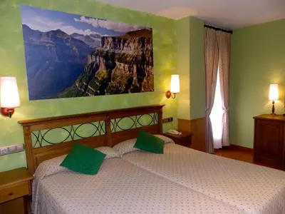 Cama o camas de una habitación en Hotel Arnal