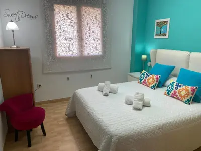 Cama o camas de una habitación en Apartamentos Alcañiz, Ana