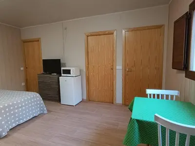 Una televisión o centro de entretenimiento en Habitación independiente II en Casa Rural Javier