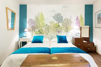 Cama o camas de una habitación en Hotel Villa San Jorge