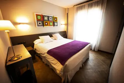 Cama o camas de una habitación en Hostal Rural Villa Vieja