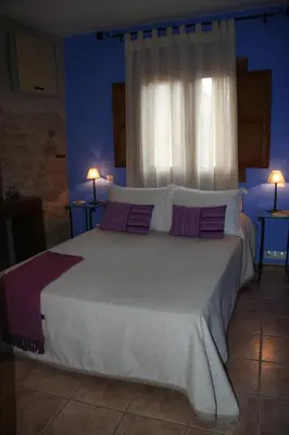 Cama o camas de una habitación en La Alquería