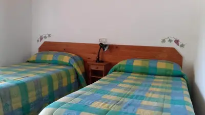 Cama o camas de una habitación en Hostal Rural Casa Pedro