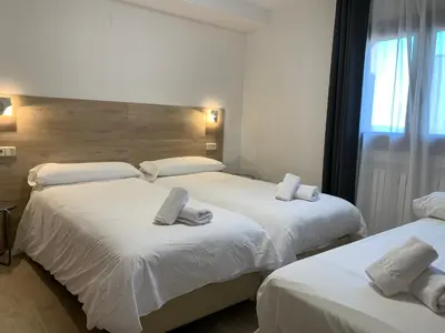 Cama o camas de una habitación en Hotel El Cobertizo