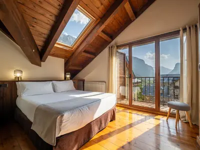 Cama o camas de una habitación en Villa de Plan Apartments&Suites