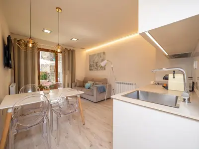 Una cocina o zona de cocina en Villa de Plan Apartments&Suites