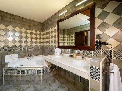 Un baño de Villa de Plan Apartments&Suites