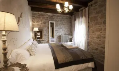 Cama o camas de una habitación en Casa Rural Cirera D'Avall