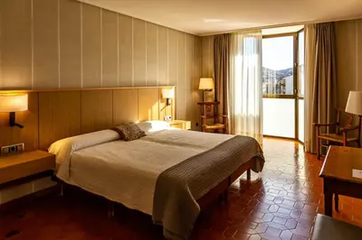 Cama o camas de una habitación en HOSTAL DOÑA JUANA