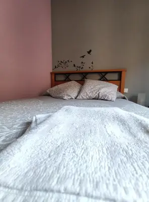 Cama o camas de una habitación en Hostal El Bodegon