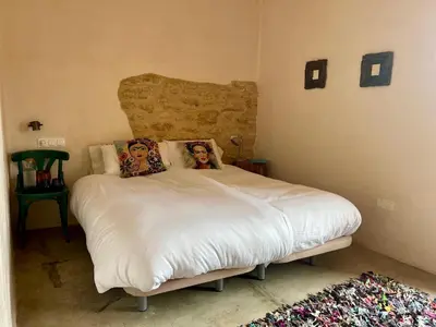 Cama o camas de una habitación en B&B Masia Katmandú