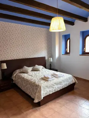 Cama o camas de una habitación en Hospedería Sádaba