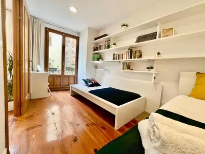 Cama o camas de una habitación en TOP APARTMENT frente a la Catedral