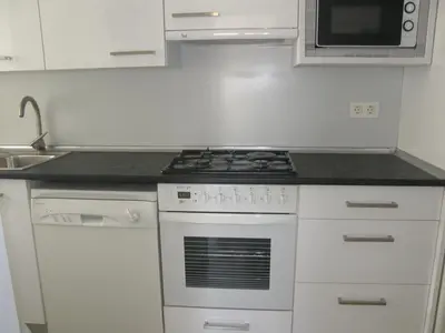 Una cocina o zona de cocina en Ático con terraza en la Jota