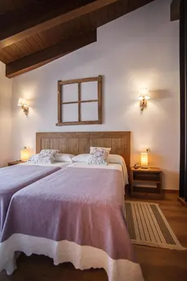 Cama o camas de una habitación en El Paller de Casa Parramon