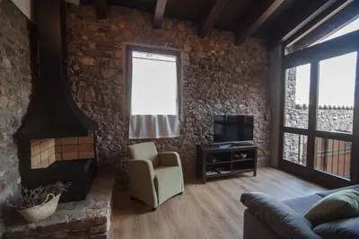 Una televisión o centro de entretenimiento en El Paller de Casa Parramon
