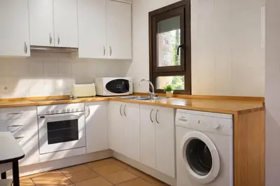 Una cocina o zona de cocina en Casa amb llar de foc - Casa Anina