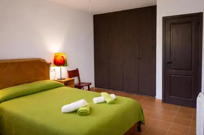 Cama o camas de una habitación en Cal Marroso de Montsonís