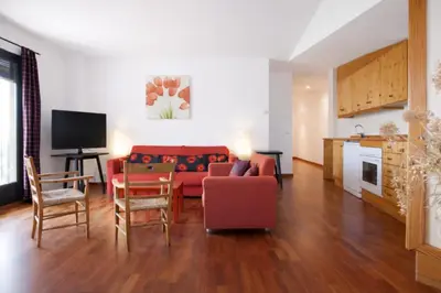 Zona de estar de Apartament amb vistes al castell - Cal Martí