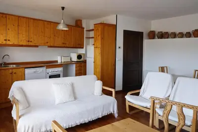 Una cocina o zona de cocina en Apartament amb llar de foc - Golfes Cal Gravat