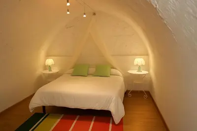 Cama o camas de una habitación en Casa amb llar de foc i vistes a la vall - Cal Valeriet