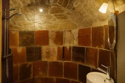 Un baño de Casa amb llar de foc i vistes a la vall - Cal Valeriet