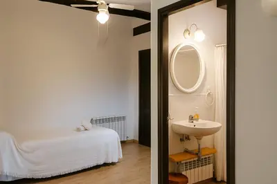 Cama o camas de una habitación en Casa amb vista a les muntanyes - Cal Valeri