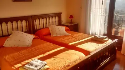 Cama o camas de una habitación en Txantxikonea Etxea