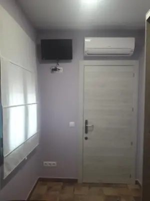 Una televisión o centro de entretenimiento en Pensión Matarraña