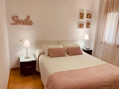 Cama o camas de una habitación en Apartamentos Alcañiz, Gala
